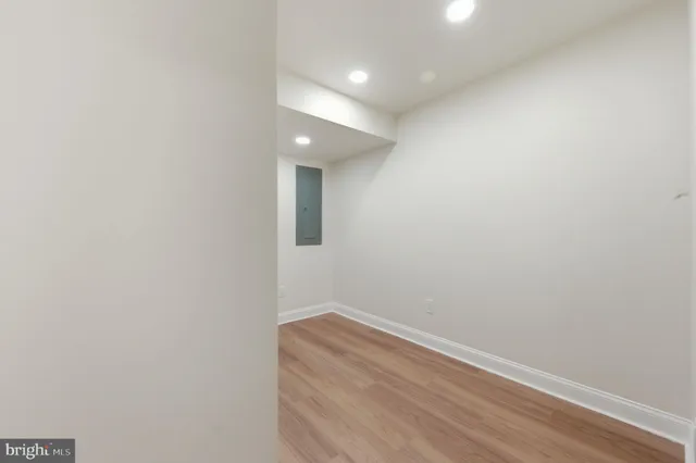 a view of backyard space with large trees