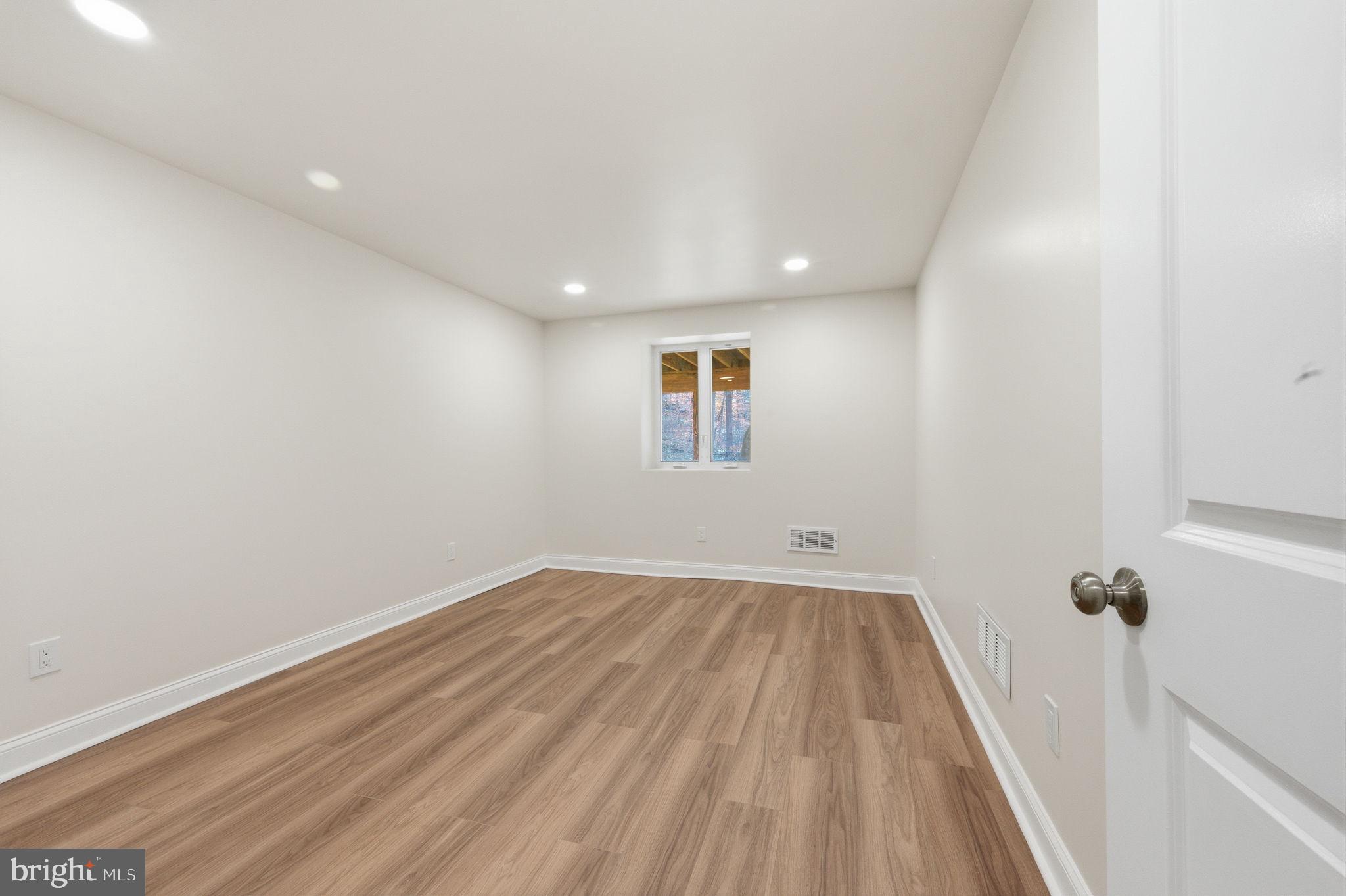 4 Meteor Lane Newark, DE 19711 - Photo 47 of 56 a view of empty room with wooden floor