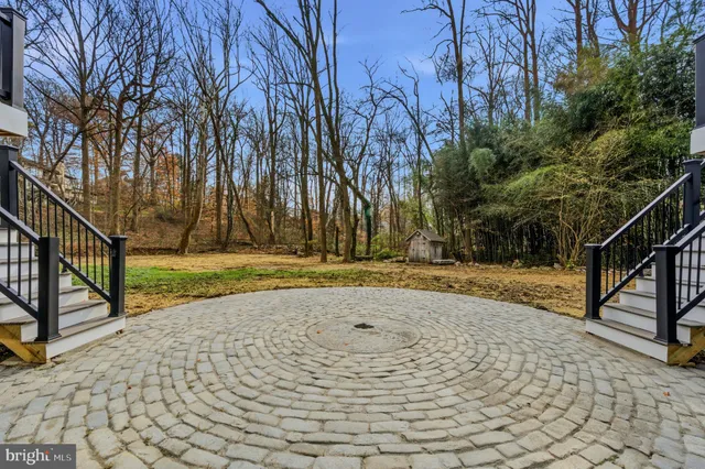 a view of backyard with green space
