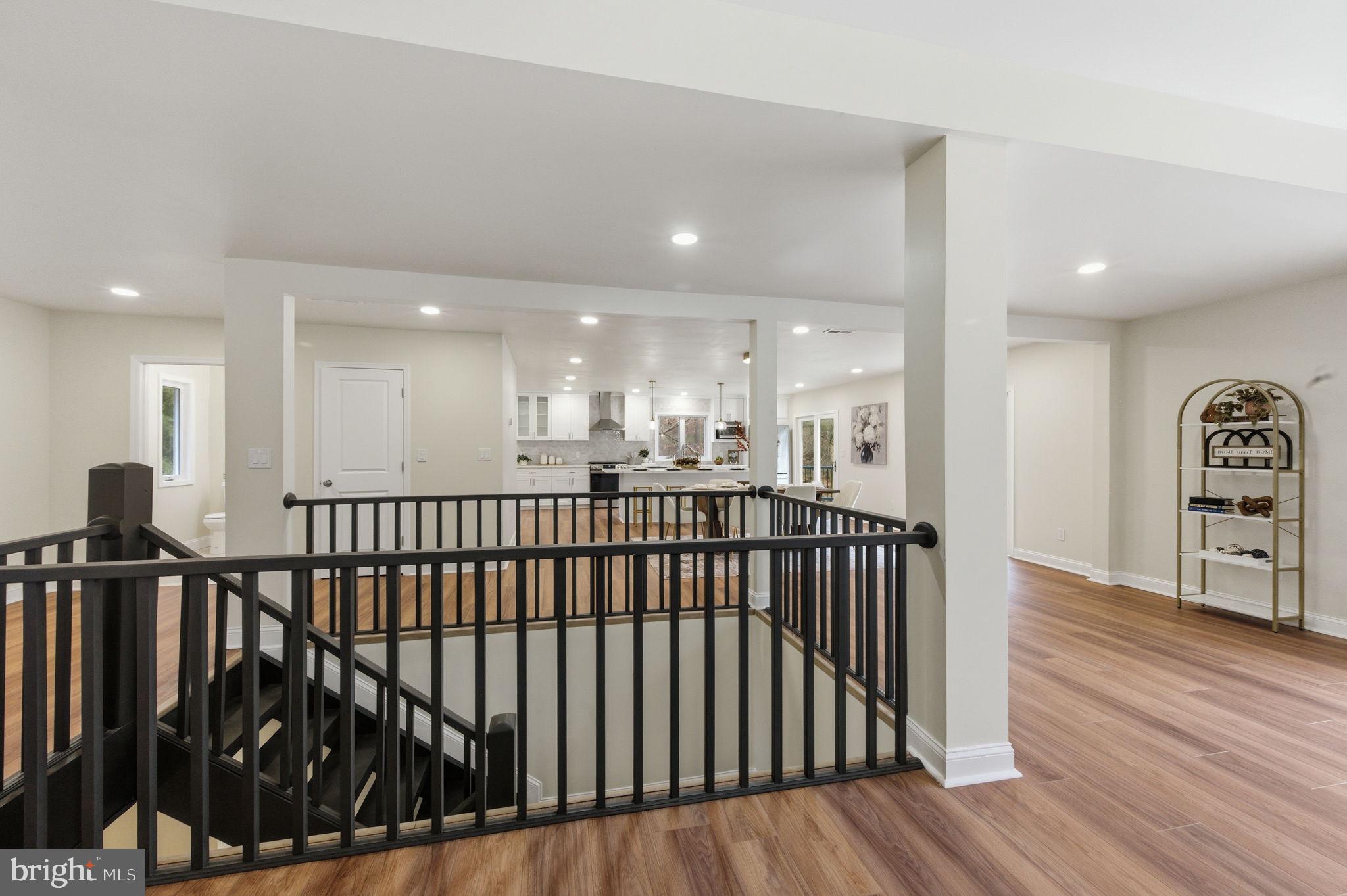 4 Meteor Lane Newark, DE 19711 - Photo 7 of 56 a view of a hallway with wooden floor