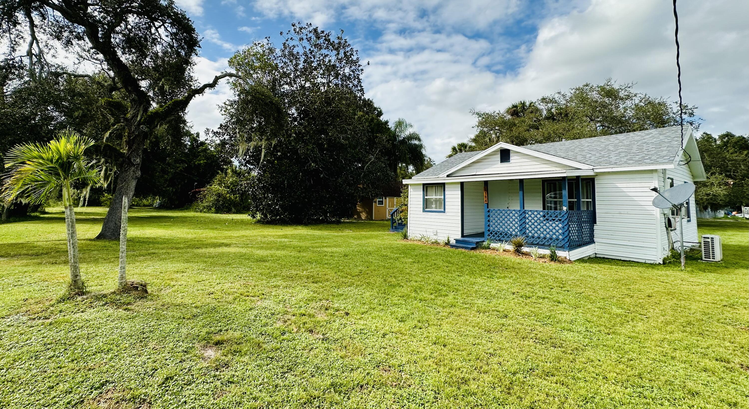 1104 Southwest 11th Street Okeechobee, FL 34974 - Photo 13 of 59 a view of a house with a yard