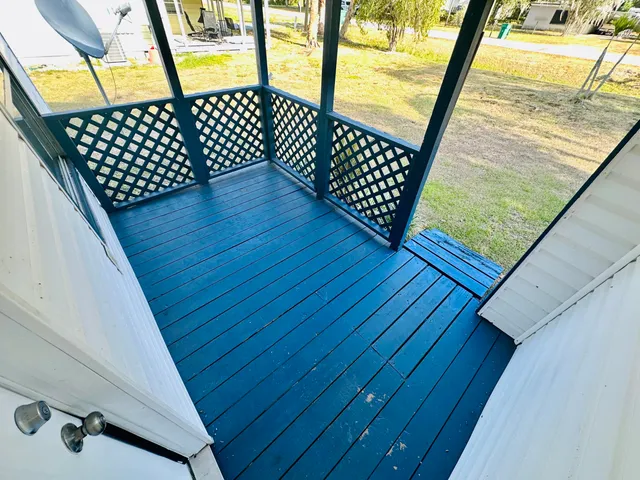 a view of backyard with green space