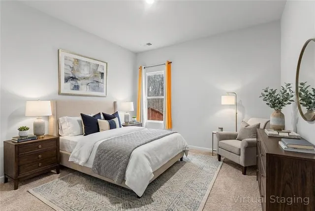 a bedroom with a bed and window