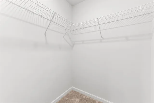 a room with furniture and a window