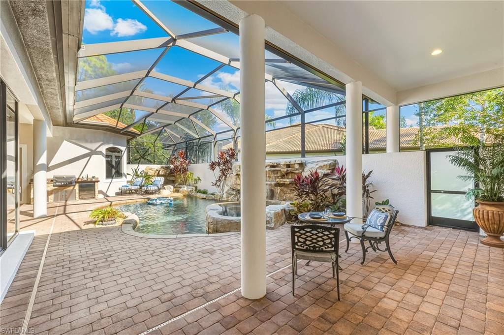 7749 Classics Drive Naples, FL 34113 - Photo 17 of 39 Outdoor space off of cabana entrance