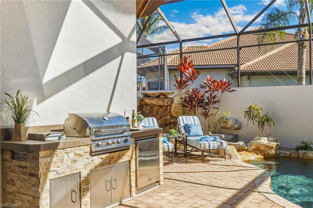 7749 Classics Drive Naples, FL 34113 - Photo 25 of 39 Outdoor kitchen