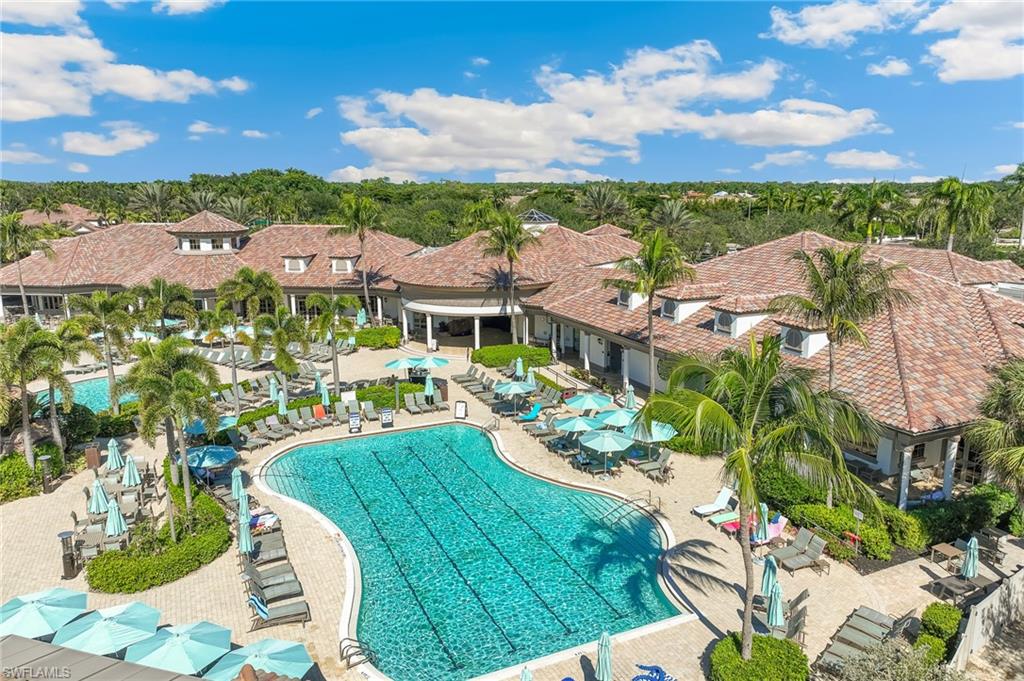 7749 Classics Drive Naples, FL 34113 - Photo 32 of 39 Lap pool at the Player's Club & Spa