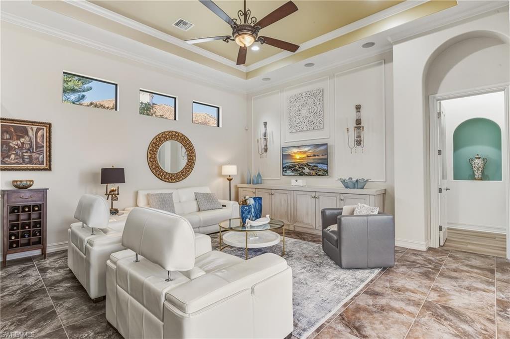 7749 Classics Drive Naples, FL 34113 - Photo 5 of 39 Family room with view to primary suite