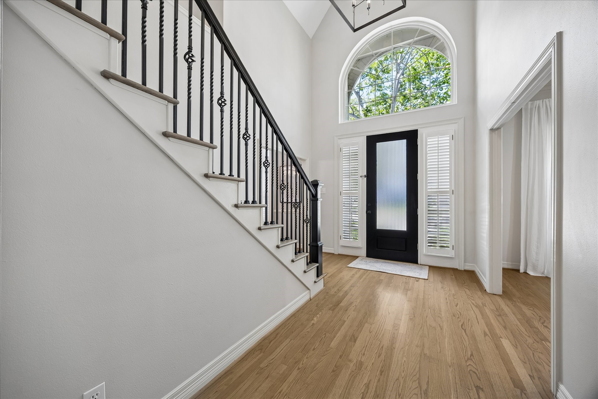 4131 Sunset Boulevard Houston, TX 77005 - Photo 5 of 38 a view of an entryway with wooden floor