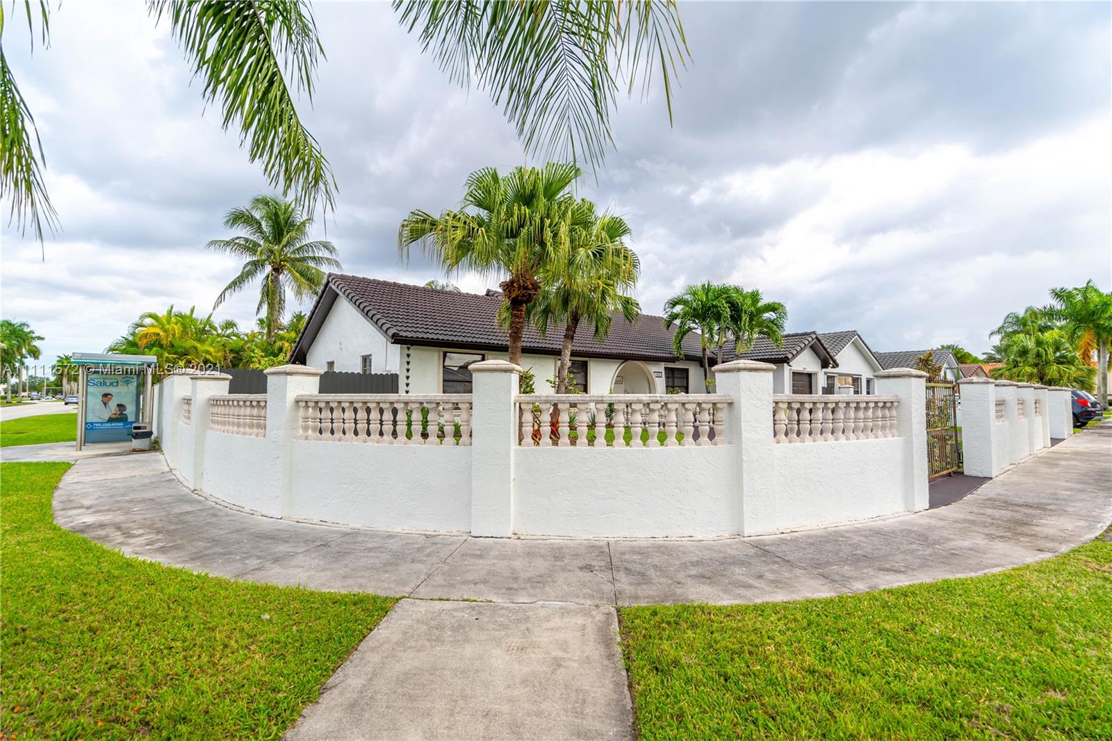 14695 Southwest 45th Street Miami, FL 33175 - Photo 15 of 33 a view of outdoor space with sign board and garden