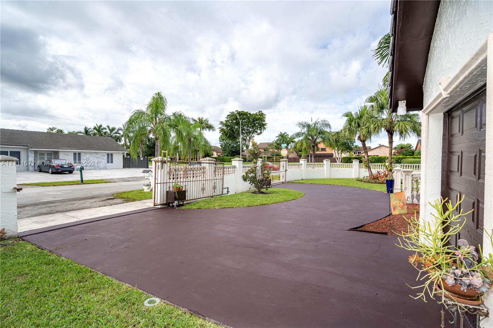 14695 Southwest 45th Street Miami, FL 33175 - Photo 16 of 33 a view of a park with swings and slides