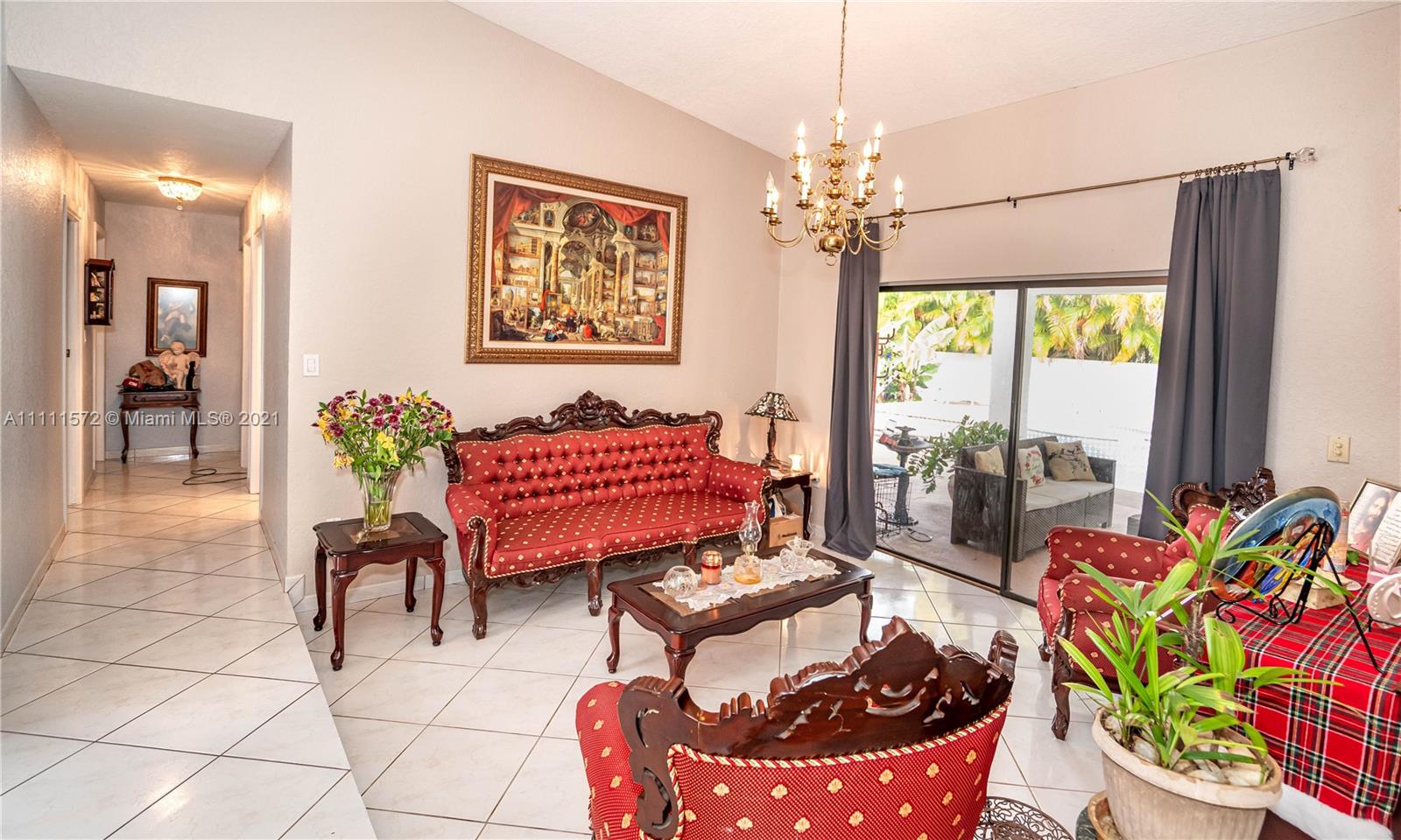 14695 Southwest 45th Street Miami, FL 33175 - Photo 24 of 33 a living room filled with furniture and a potted plant