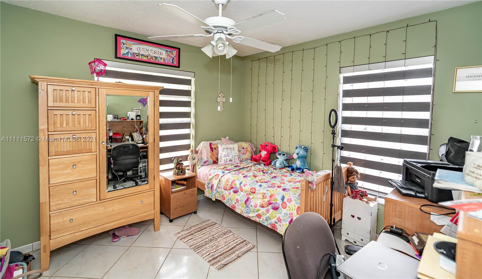 14695 Southwest 45th Street Miami, FL 33175 - Photo 28 of 33 a bedroom with a bed and furniture