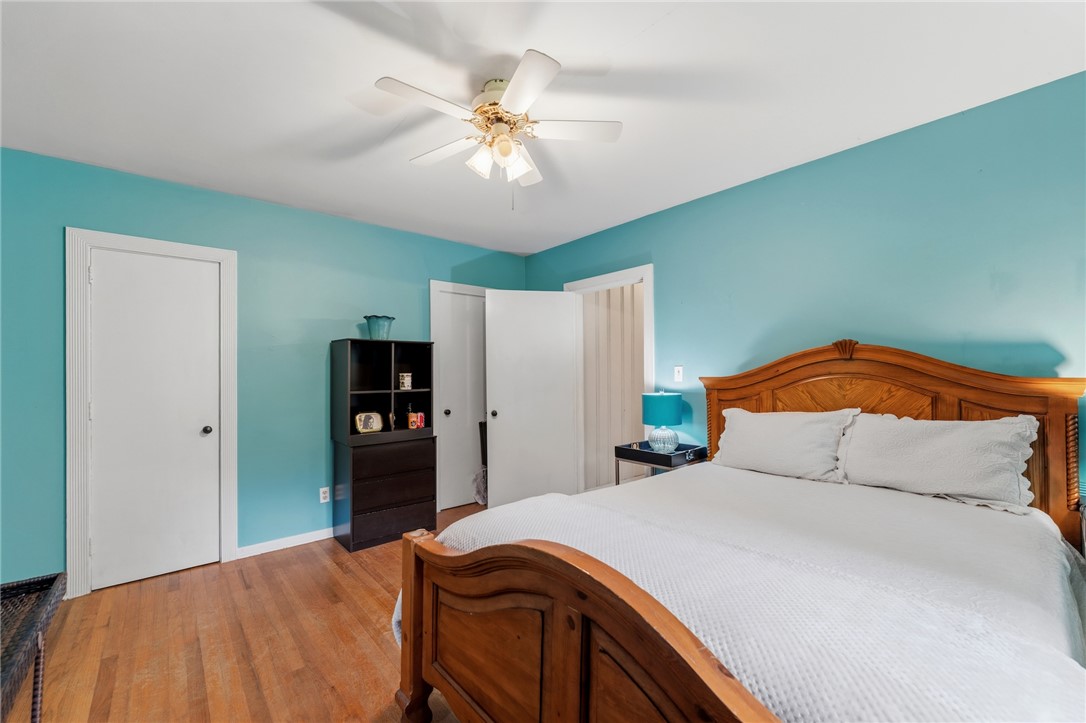 1105 Greenacres Anderson, SC 29621 - Photo 29 of 46 Hardwood floors and a ceiling fan create a comfortable atmosphere in this inviting bedroom.