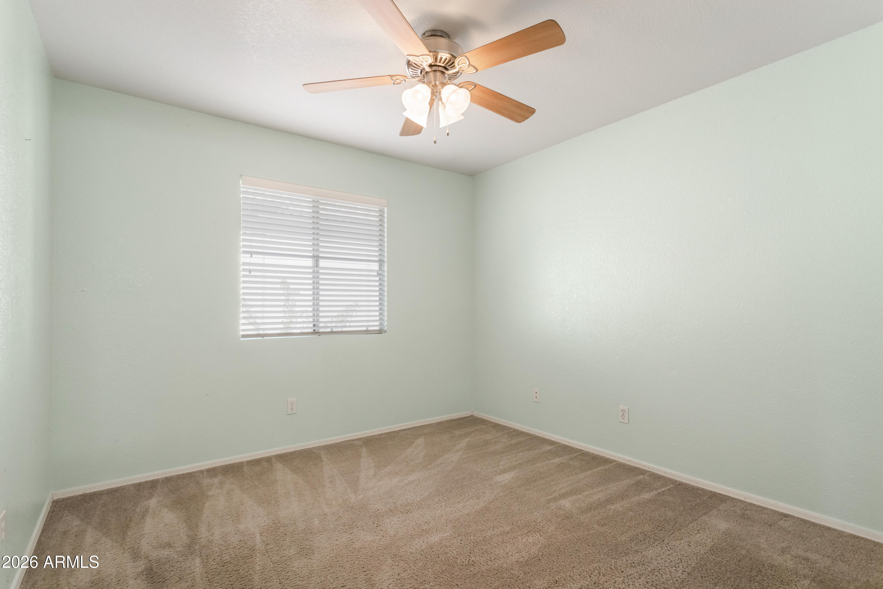 4682 Chaparral Loop Sierra Vista, AZ 85635 - Photo 14 of 28 an empty room with windows and fan