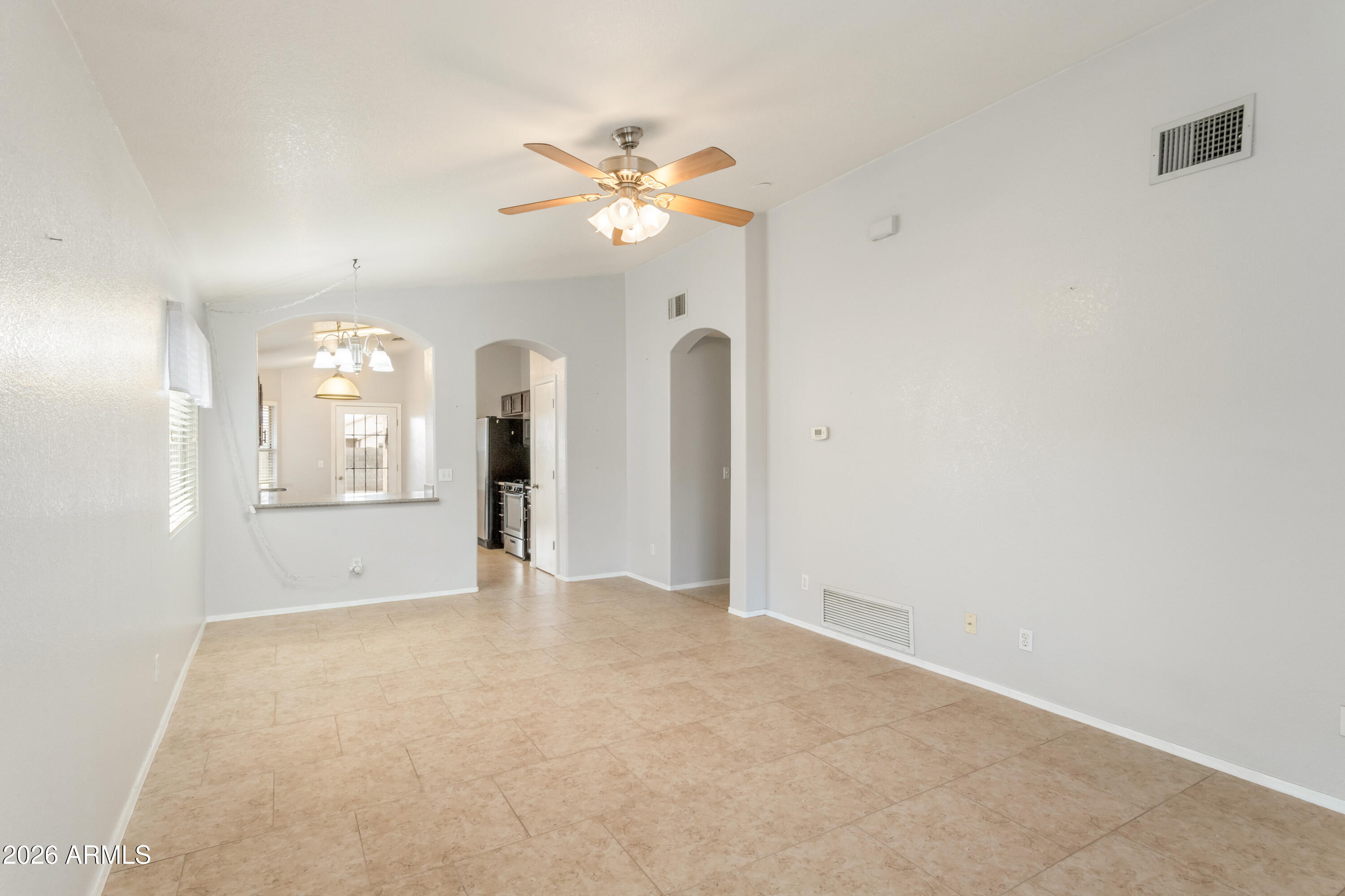 4682 Chaparral Loop Sierra Vista, AZ 85635 - Photo 8 of 28 a view of an empty room with a window