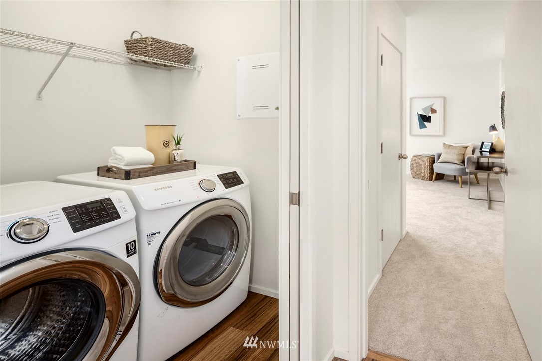 1829 24th Avenue, Unit A Seattle, WA 98122 - Photo 16 of 25 a view of storage and utility room with washer and dryer