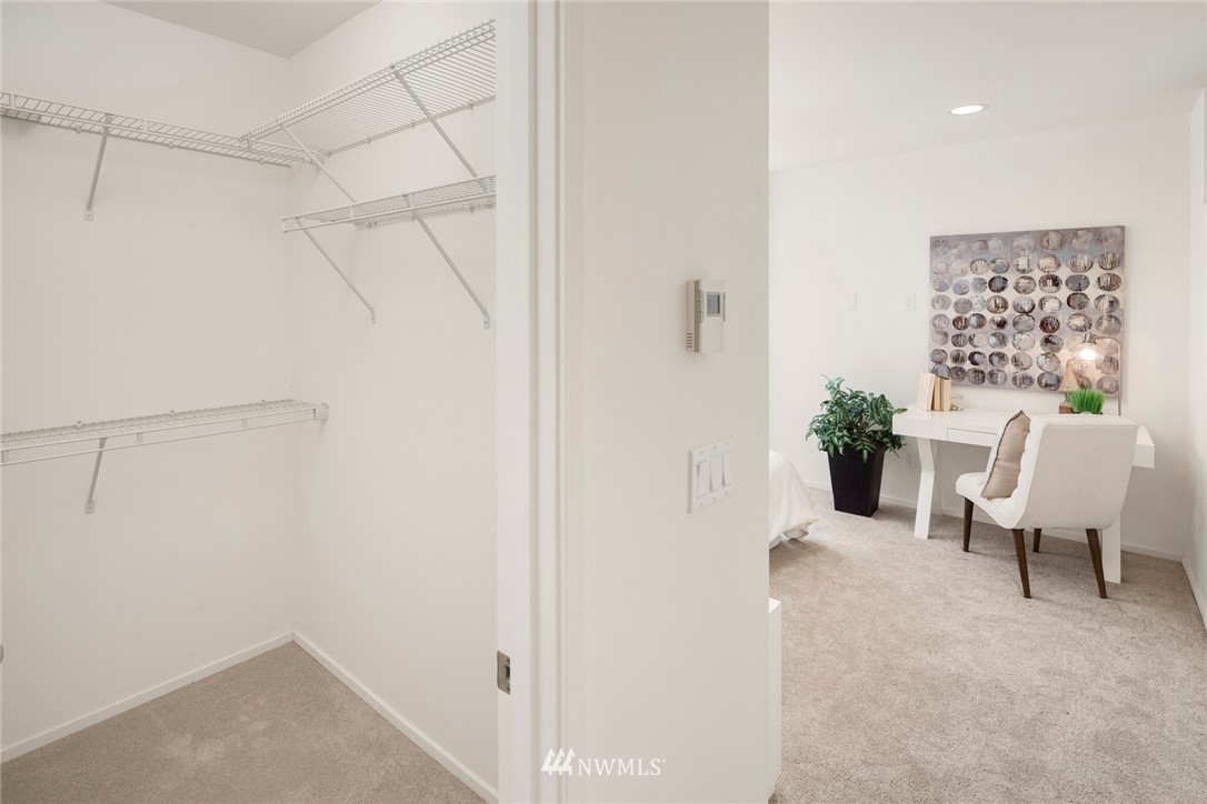 1829 24th Avenue, Unit A Seattle, WA 98122 - Photo 19 of 25 a living room with furniture and a potted plant