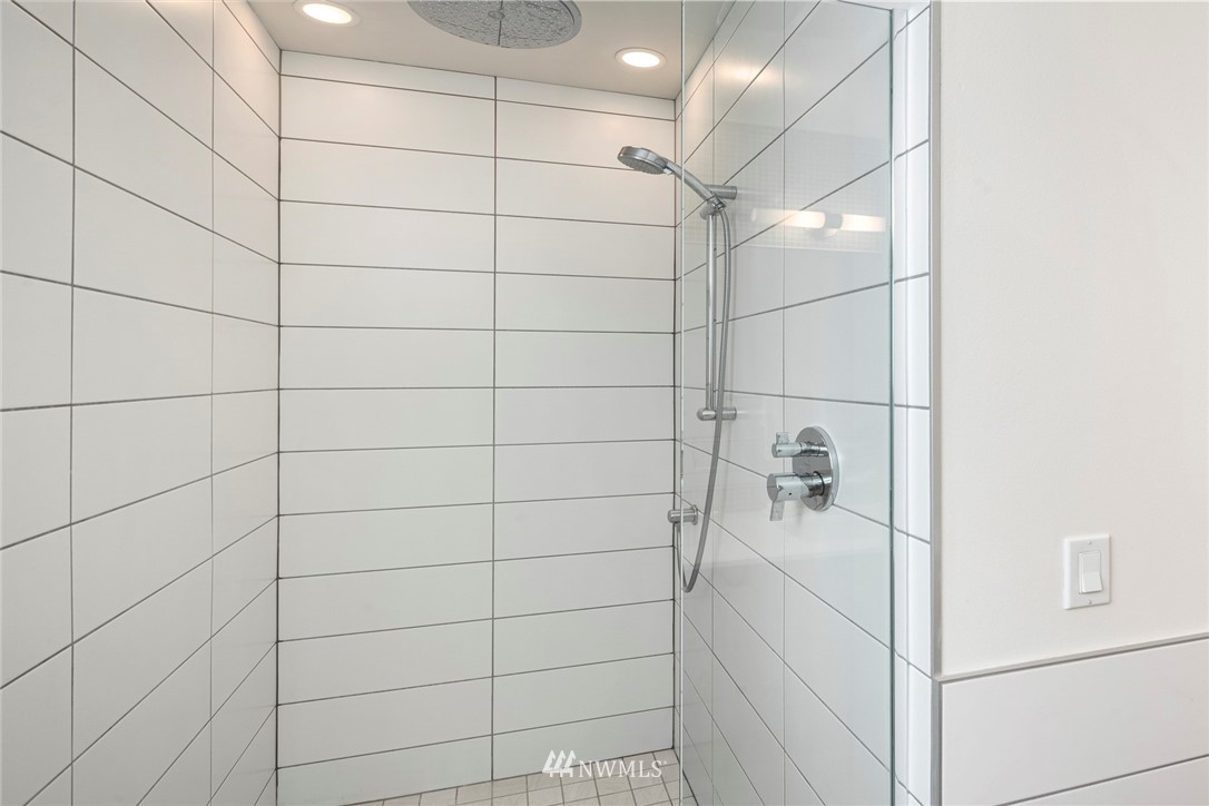 1829 24th Avenue, Unit A Seattle, WA 98122 - Photo 21 of 25 a bathroom with a shower