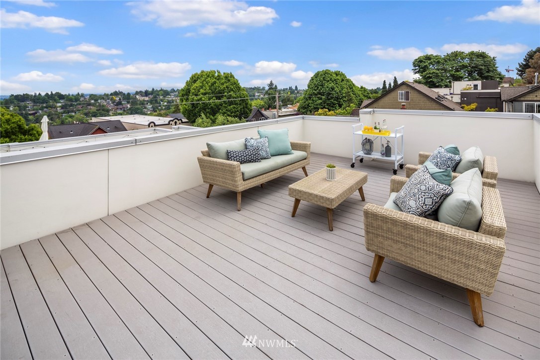 1829 24th Avenue, Unit A Seattle, WA 98122 - Photo 23 of 25 a outdoor living room with furniture and a garden