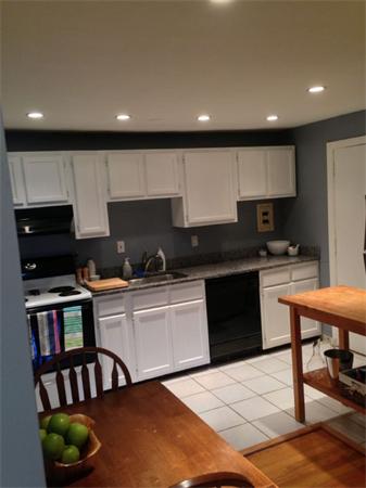 245 Kelton Street, Unit 11 Boston, MA 02134 - Photo 2 of 12 a kitchen with a sink cabinets and appliances