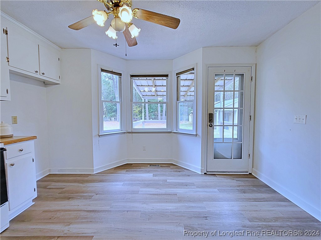 210 Cypress Road Cameron, NC 28326 - Photo 17 of 50 a view of an empty room with a window