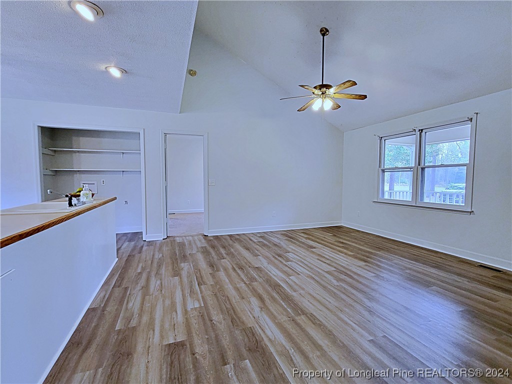 210 Cypress Road Cameron, NC 28326 - Photo 8 of 50 wooden floor in an empty room with a window