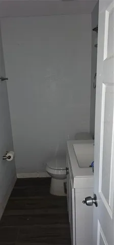 a bathroom with a toilet and a sink