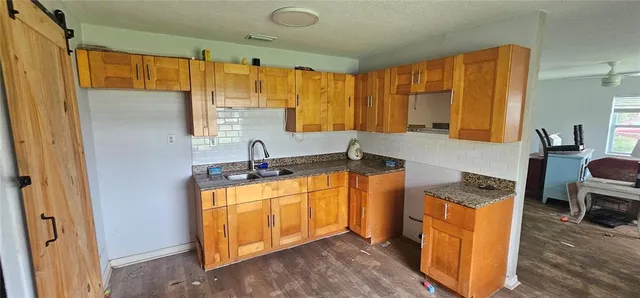 a room with a window and a sink