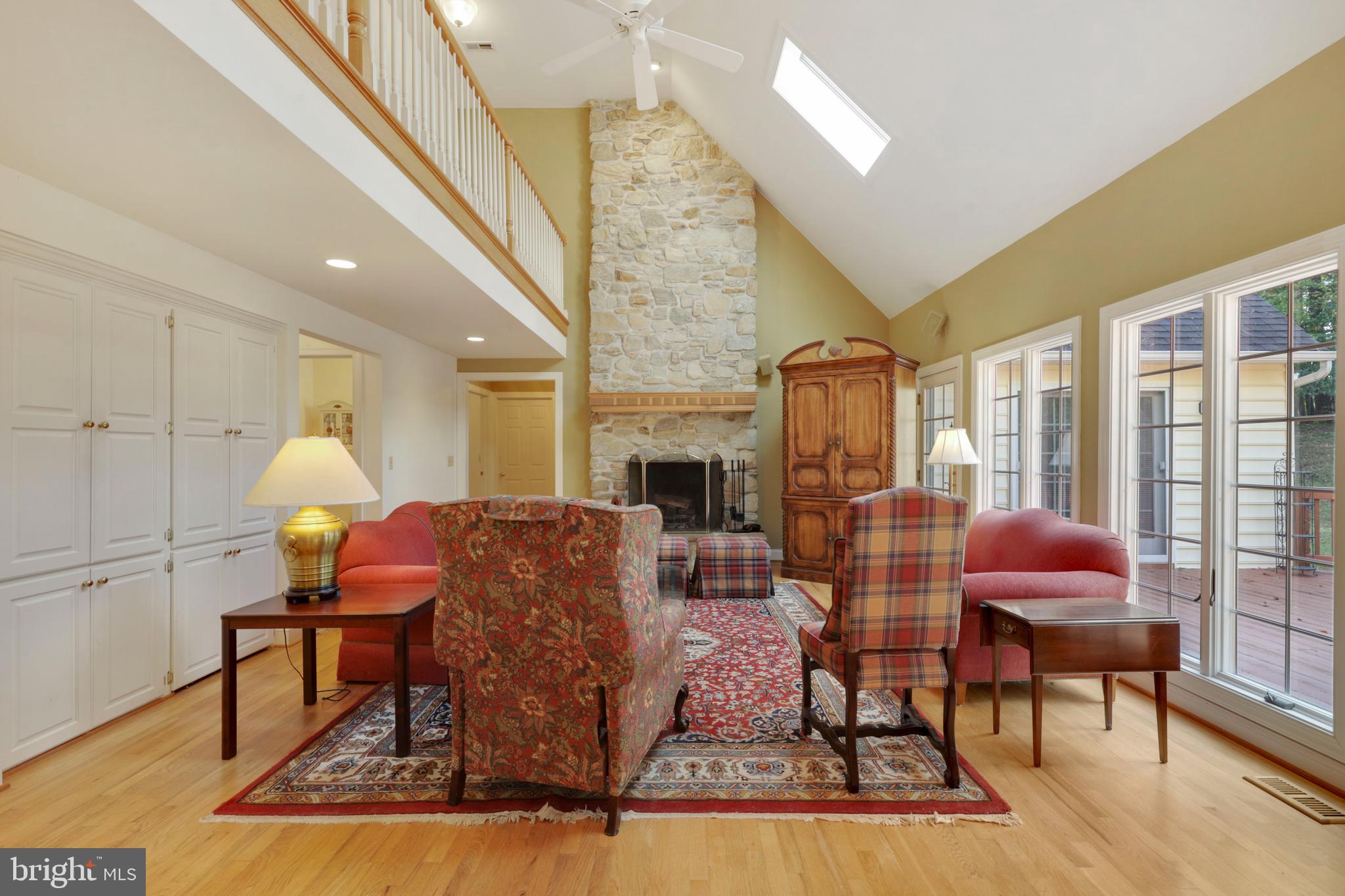 16302 Falls Road Upperco, MD 21155 - Photo 22 of 82 Two Story Family Room with Doors to Rear Deck
