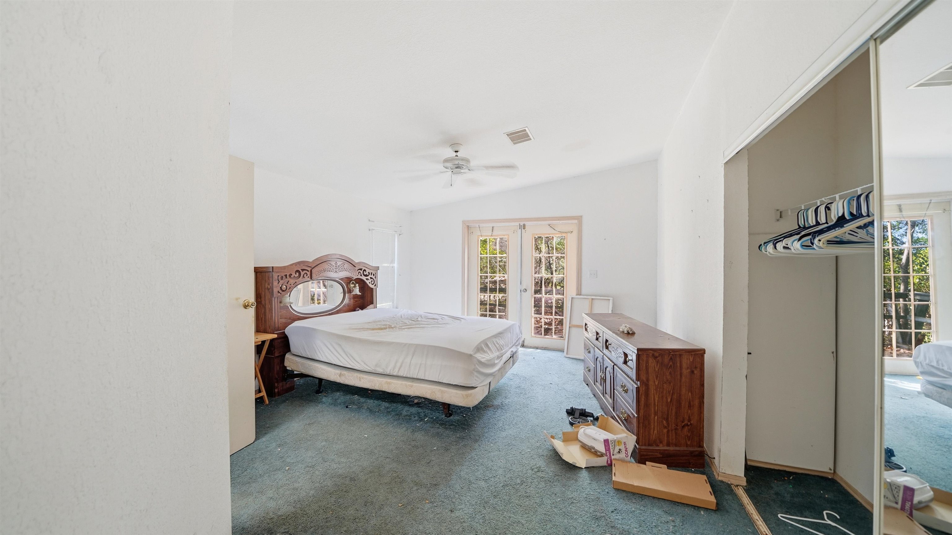 7451 Hilltop Street Keystone Heights, FL 32656 - Photo 17 of 24 a bedroom with a bed and a window