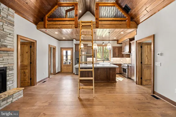 a view of a lobby with furniture and chandelier