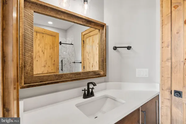 wooden floor with white walls