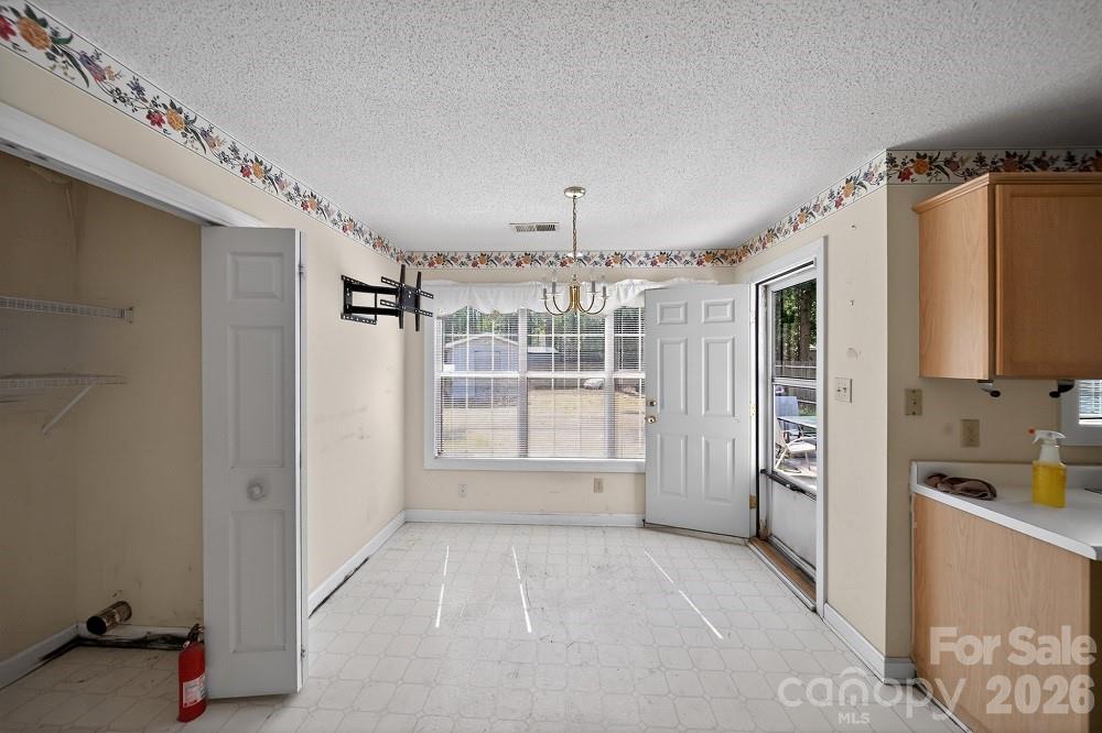 2205 Old Sparta Road Rocky Mount, NC 27804 - Photo 8 of 25 a view of an empty room