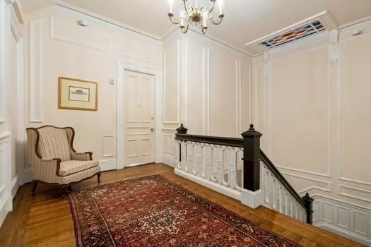 252 Commonwealth Avenue, Unit 4 Boston, MA 02116 - Photo 12 of 14 a living room with furniture and a rug