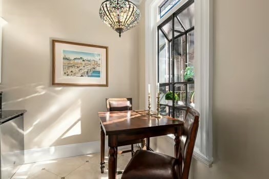 252 Commonwealth Avenue, Unit 4 Boston, MA 02116 - Photo 7 of 14 a view of a dining room with furniture window and outside view