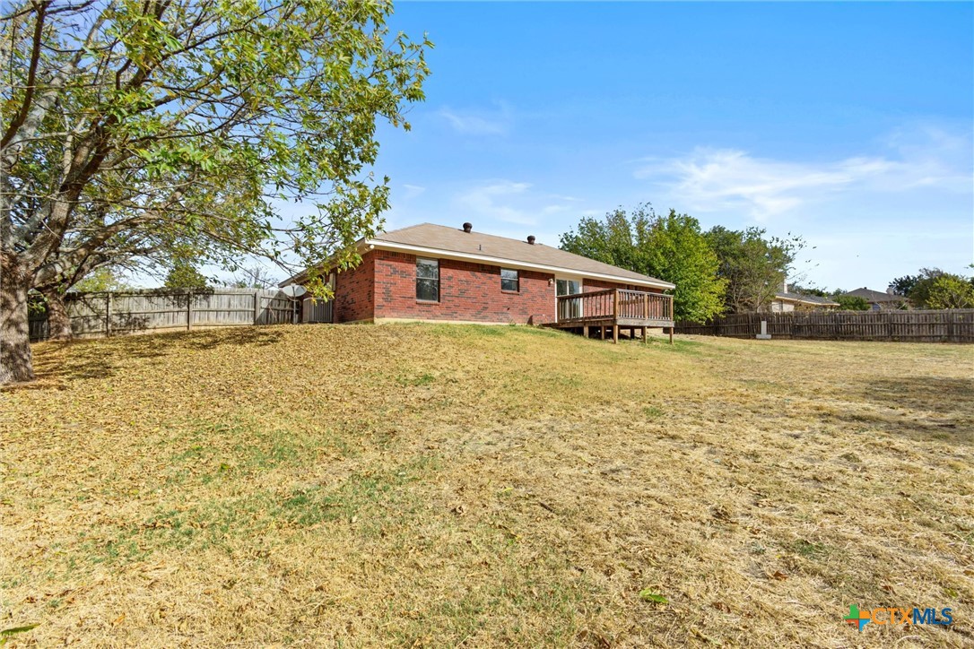 180 County Road 4933 Kempner, TX 76539 - Photo 22 of 24 a view of house with yard and trees in the background