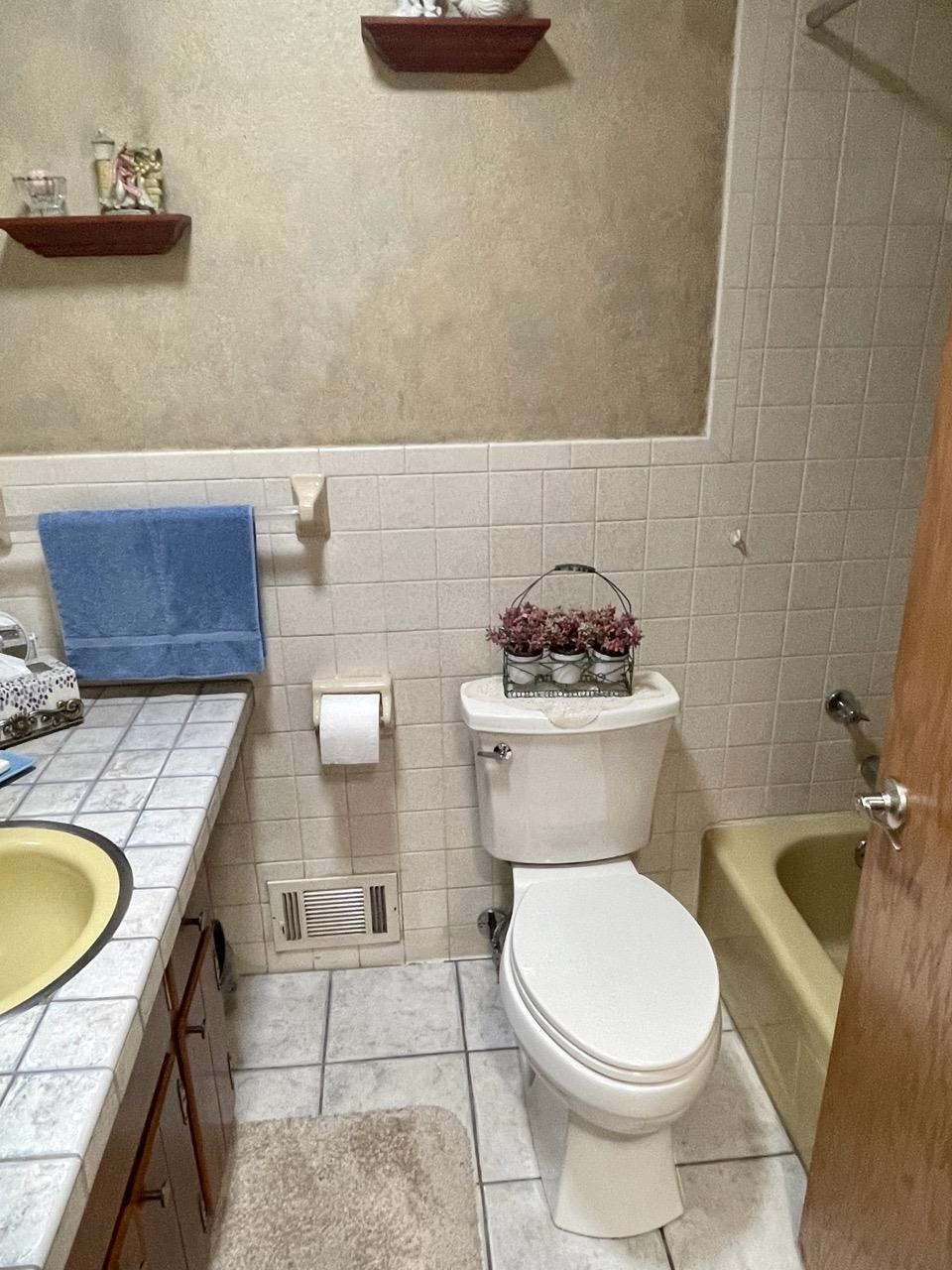 6840 Best Road Pecatonica, IL 61063 - Photo 12 of 29 a bathroom with a sink a toilet and a mirror