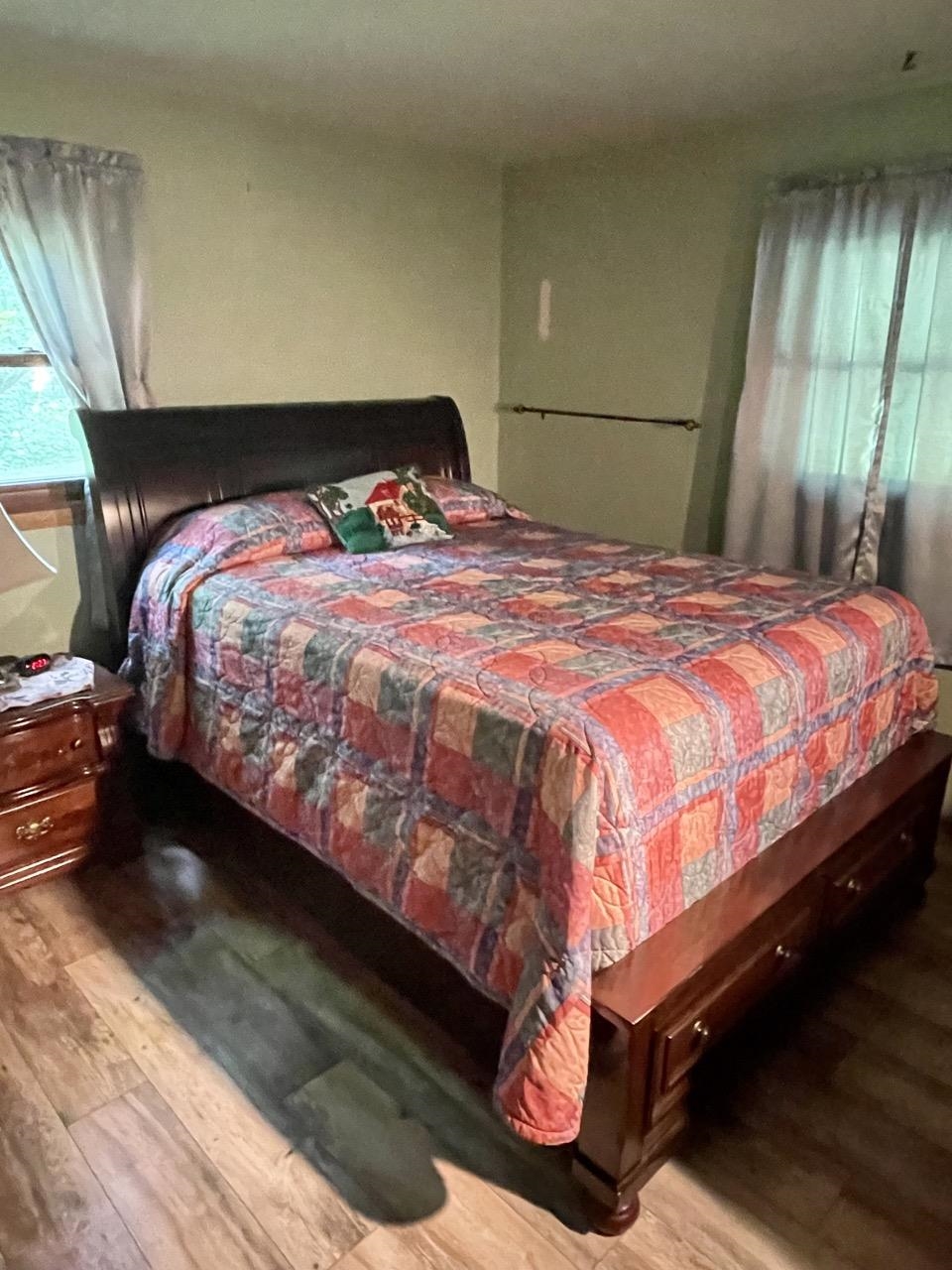 6840 Best Road Pecatonica, IL 61063 - Photo 16 of 29 a bedroom with a bed and window