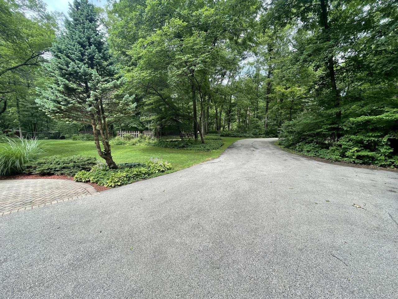 6840 Best Road Pecatonica, IL 61063 - Photo 29 of 29 a view of a street with a trees