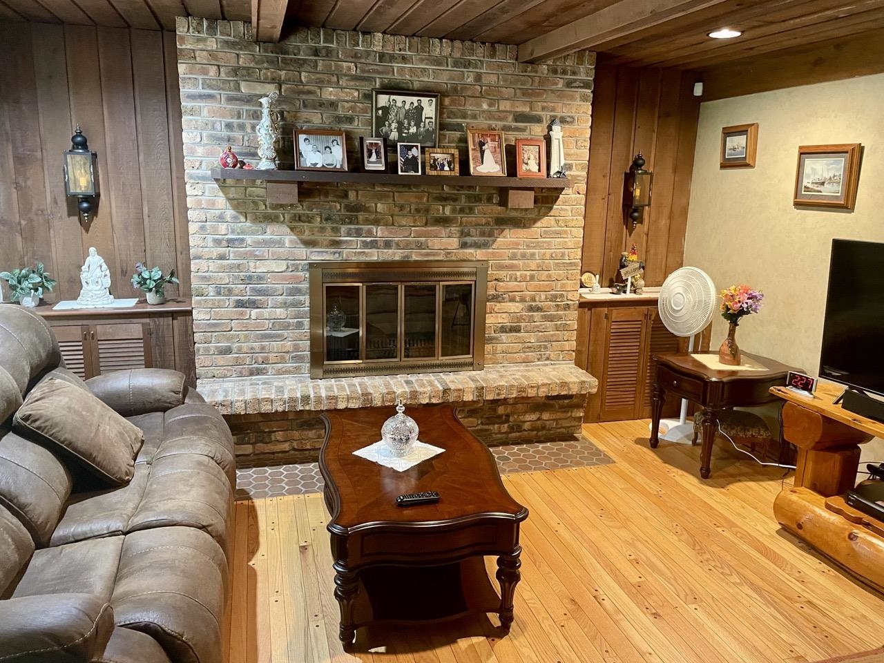 6840 Best Road Pecatonica, IL 61063 - Photo 5 of 29 a living room with furniture and a fireplace