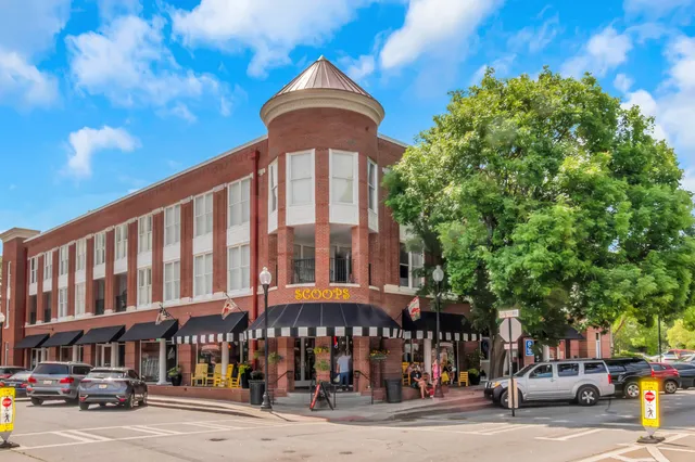 a front view of a building with street view