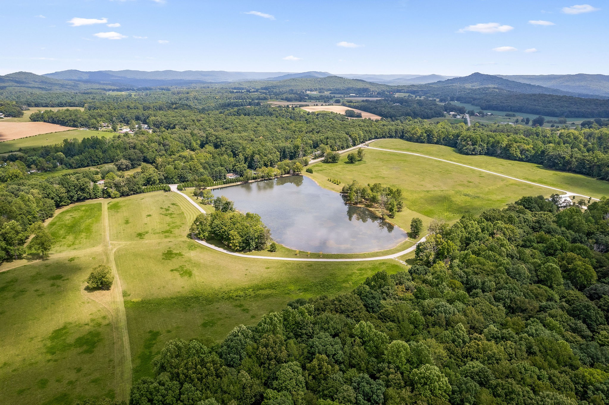 2641 Stamps Shady Grove Road Monterey, TN 38574 - Photo 13 of 70 a view of a swimming pool with a yard