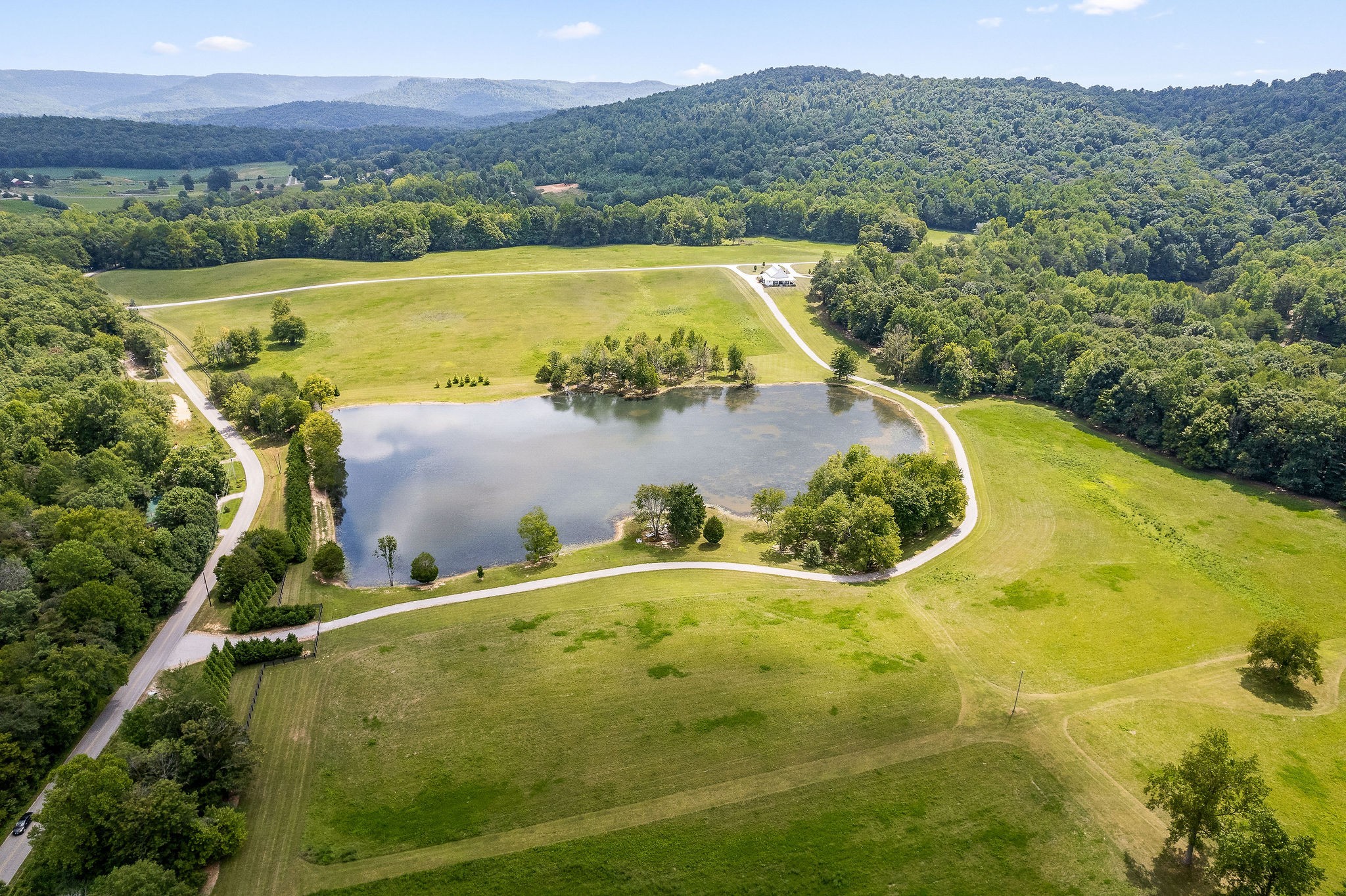 2641 Stamps Shady Grove Road Monterey, TN 38574 - Photo 21 of 70 a view of a swimming pool with a lake view
