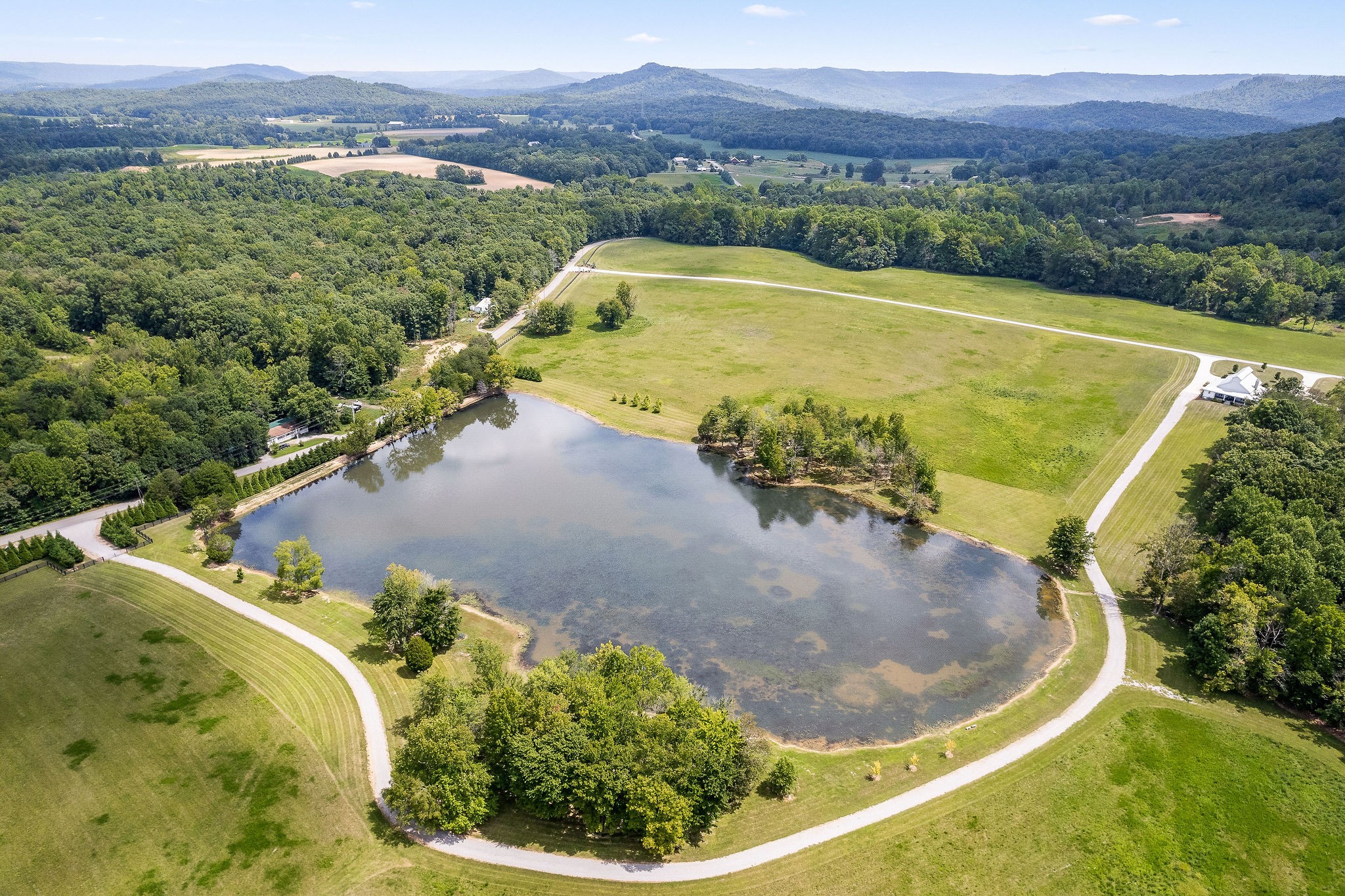 2641 Stamps Shady Grove Road Monterey, TN 38574 - Photo 23 of 70 a view of a swimming pool with a yard and a lake view