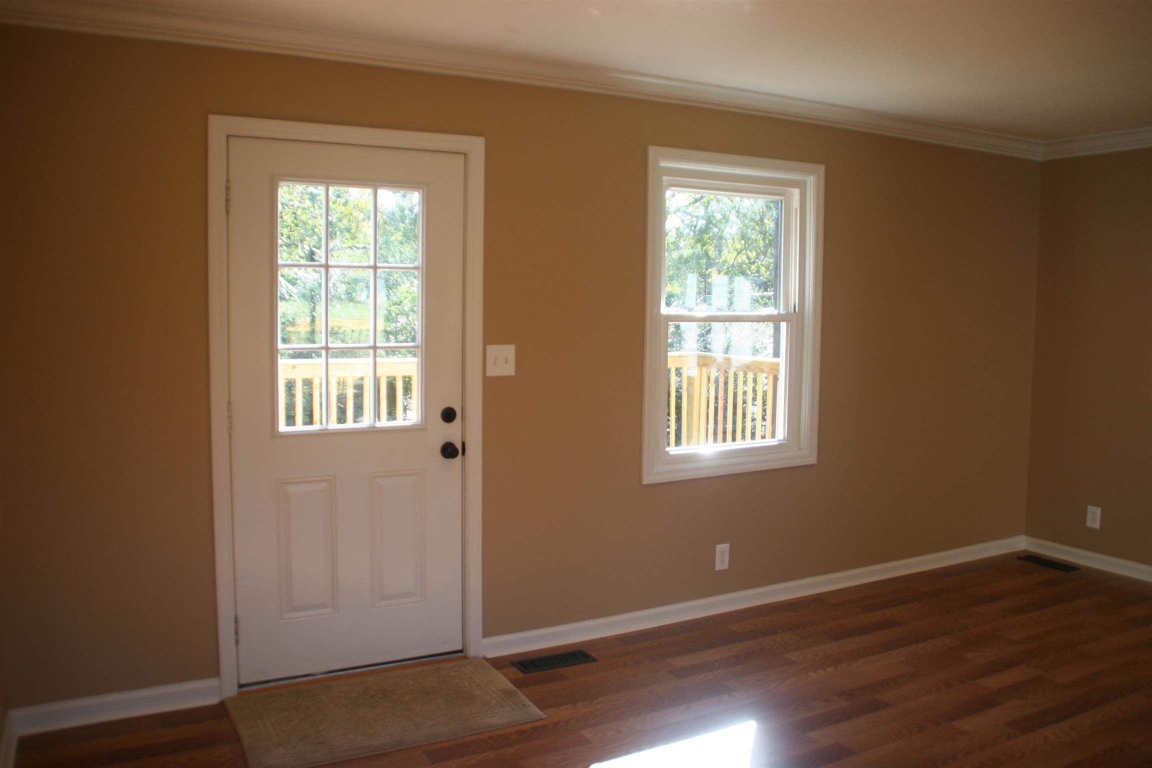 502 High Point Road Clarksville, TN 37042 - Photo 12 of 30 Just on the Other Side of the Fridge is the Side Door Leading out to the Deck & Driveway.