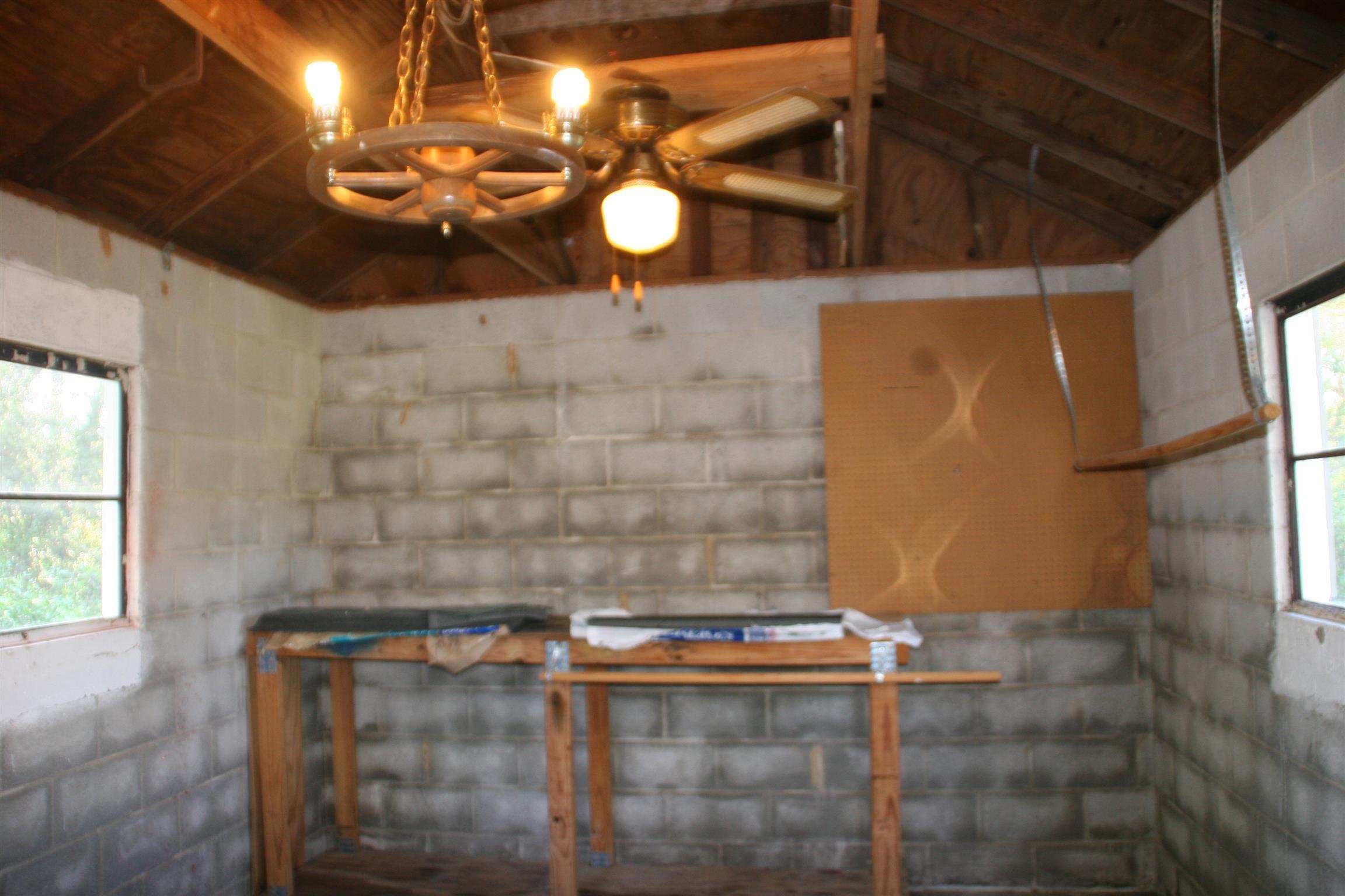 502 High Point Road Clarksville, TN 37042 - Photo 29 of 30 The Matching Shed or WorkShop has Block Walls, Concrete Floors, Electricity, A Workbench, & a New Roof.