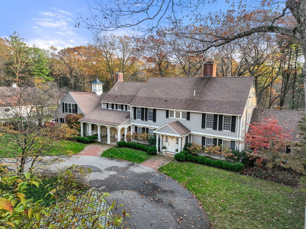 18 Audubon Road Wayland, MA 01778 - Photo 3 of 41 a view of house with garden and tall trees