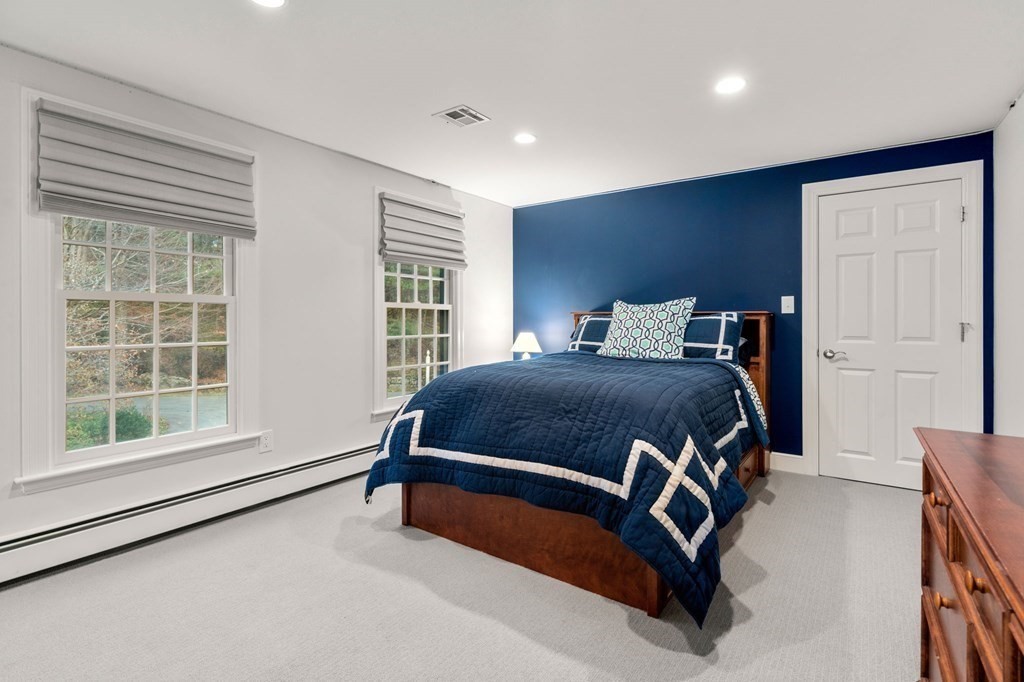 18 Audubon Road Wayland, MA 01778 - Photo 34 of 41 a bedroom with a bed and window