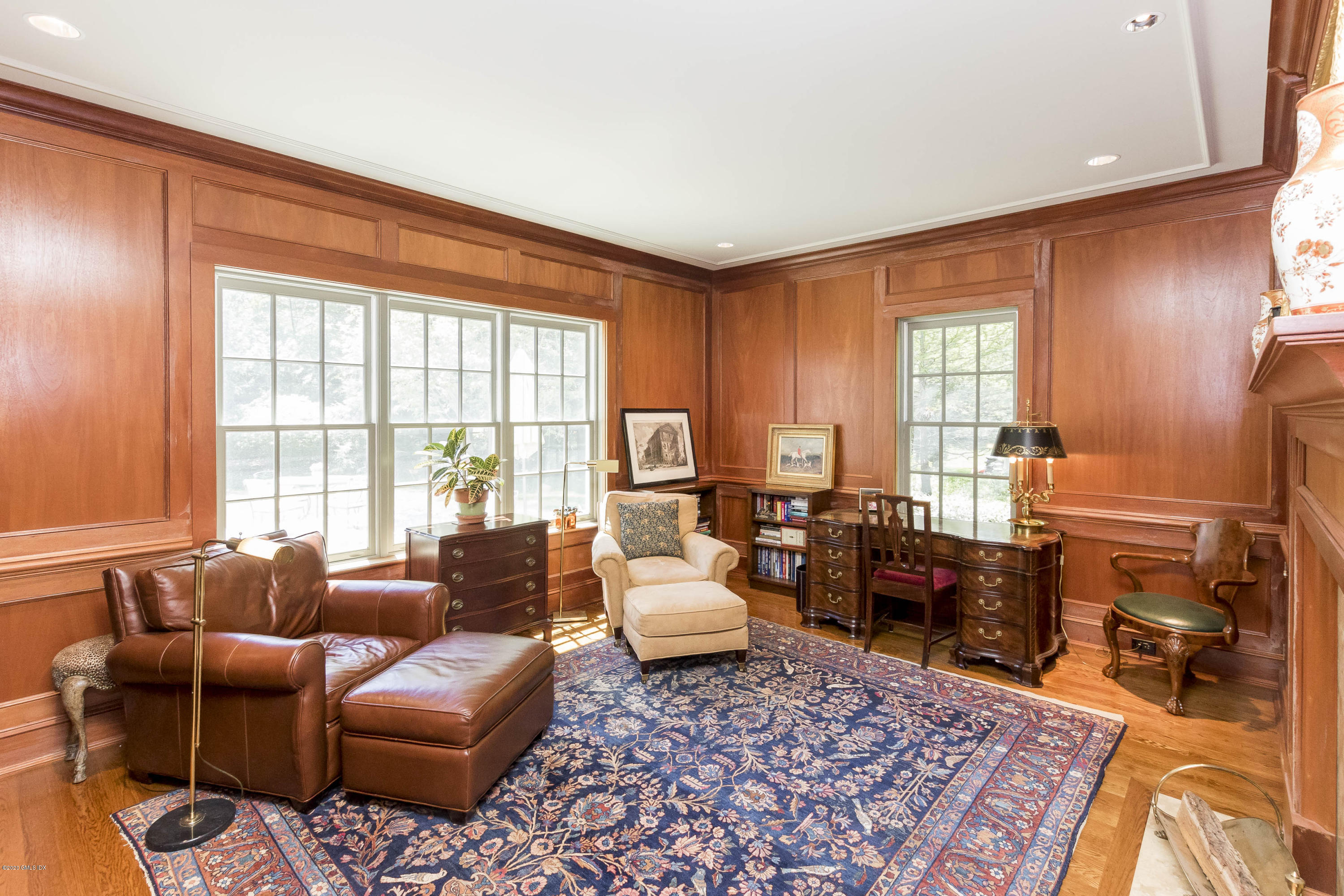8 Hockanum Road Westport, CT 06880 - Photo 12 of 41 a living room with furniture or couch and two windows